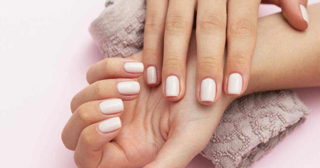 woman showing her beautiful nails